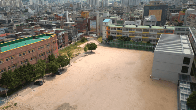 School playground surrounded by buildings
