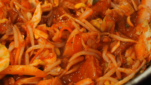 Spicy stir-fried pork with vegetables and meat