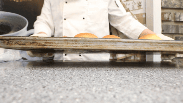 Freshly baked bread on a tray