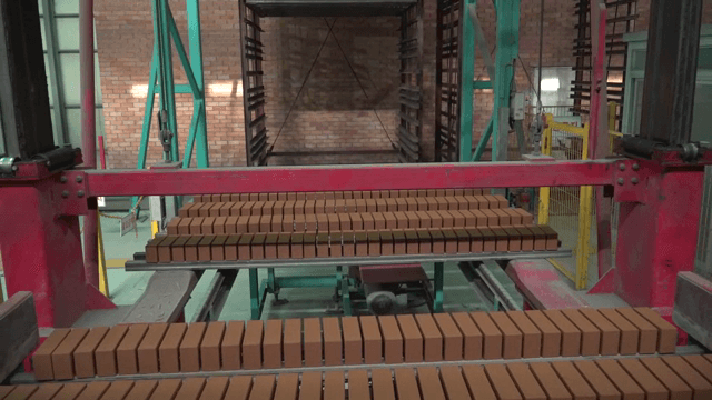 Bricks on a conveyor in a factory