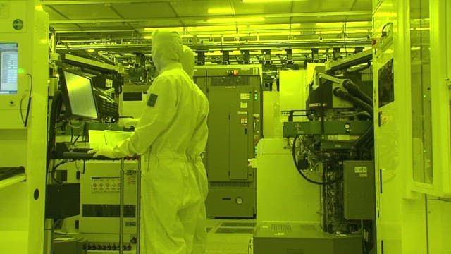 Technician Monitoring Equipment in a Lab