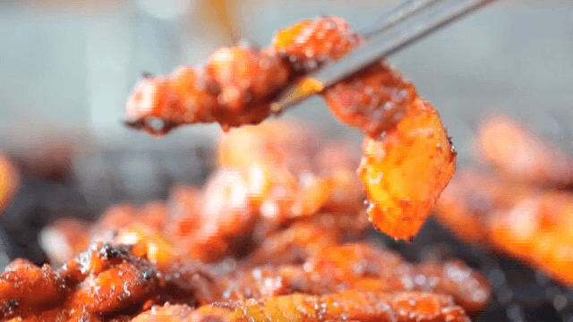 Marinated Grilled Pork Belly with chopsticks