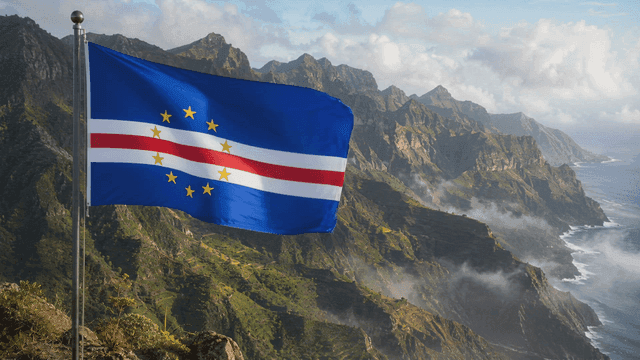 Cape Verde flag fluttering over mountain landscape