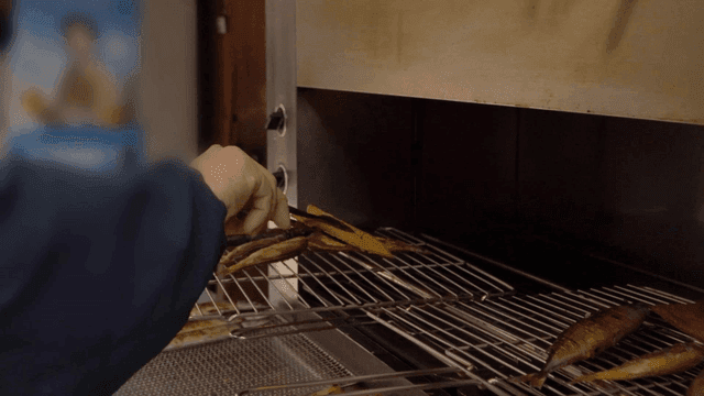 Grilled fish baked in kitchen oven