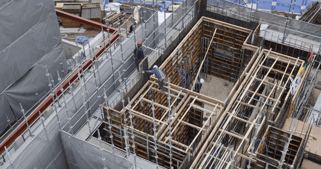 Construction site with scaffolding and materials