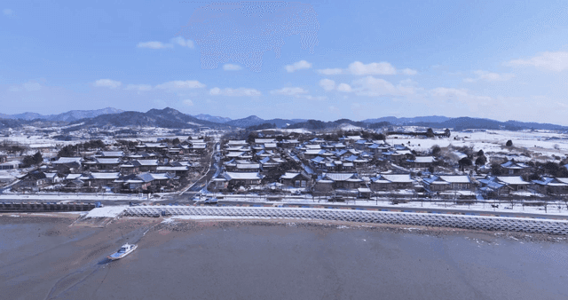 Snow-covered traditional Hanok village