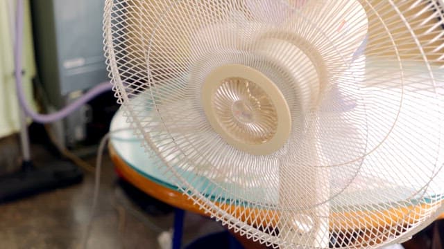 Fan spinning indoors