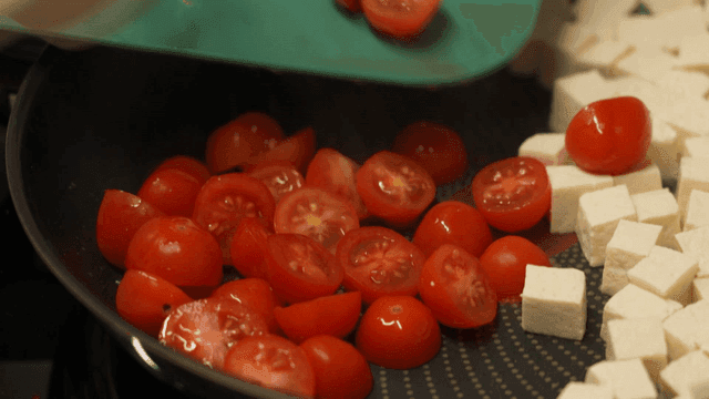 Cherry tomatoes and tofu in a pan