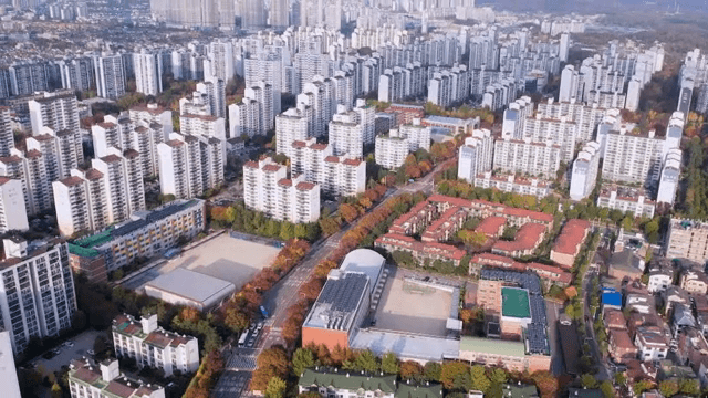 Aerial view of a city with tall buildings