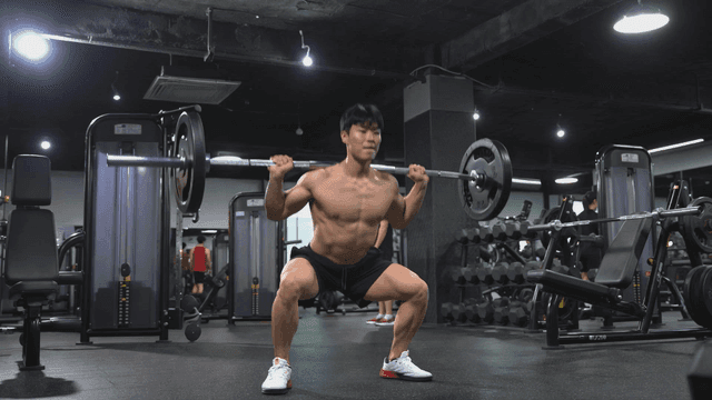 Man lifting weights at gym