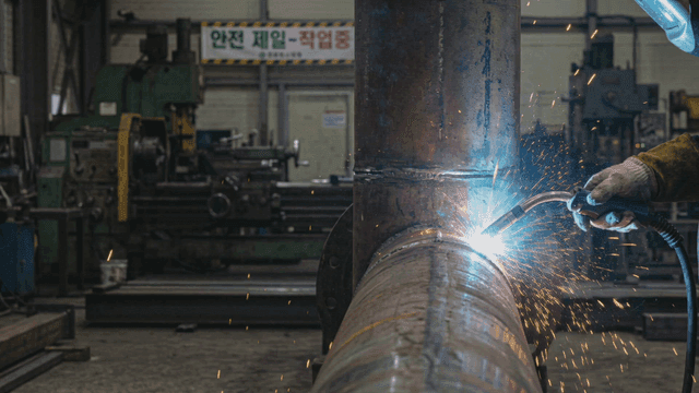 Welding sparks in a factory setting