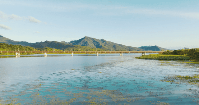 Tranquil lake surrounded by mountains