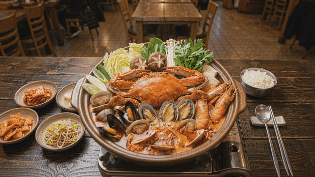 Steaming seafood hot pot in cozy restaurant