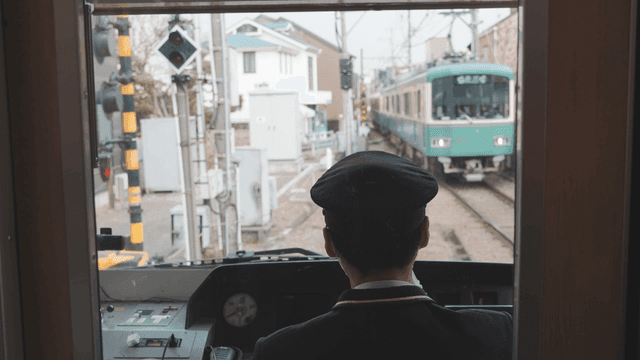 Back view of subway driver