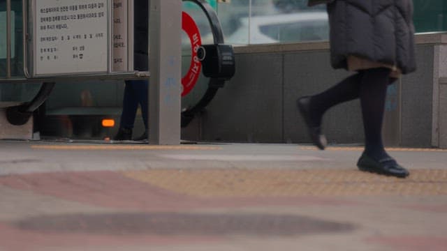 People walking near an escalator entrance