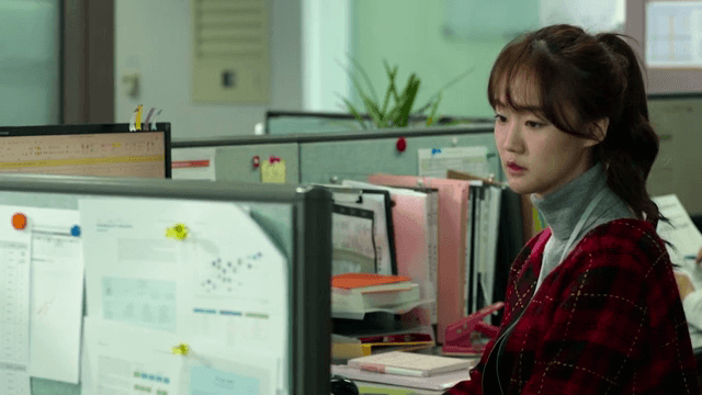 Woman working at her desk in an office