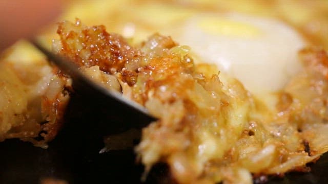 Texture of Deliciously Pressed Food on an Iron Plate