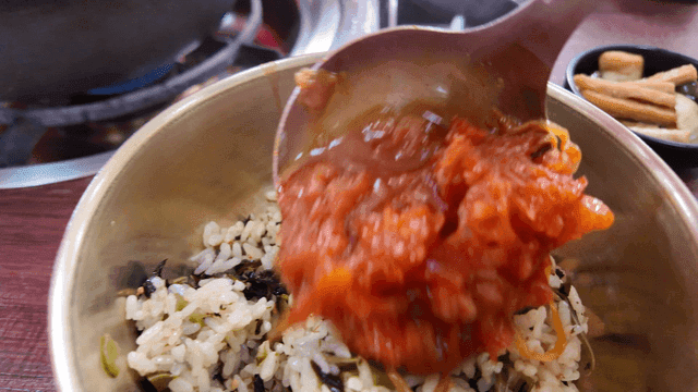 Spicy pork rib broth served over rice