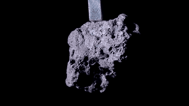 Rotating appearance of dark rocks