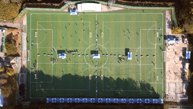 Aerial view of soccer field with people