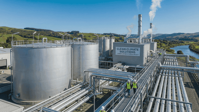 Industrial facility with large tanks and pipes