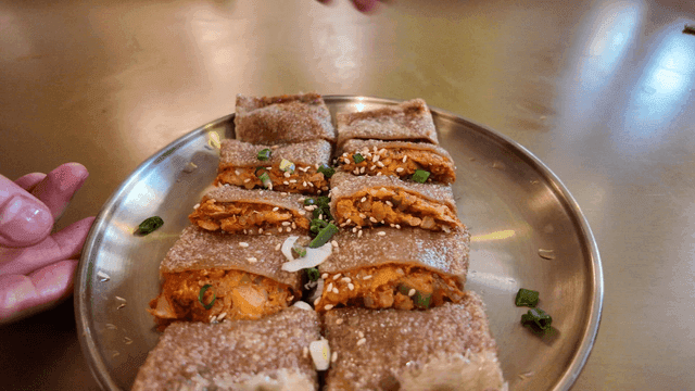 Buckwheat pancakes served on table