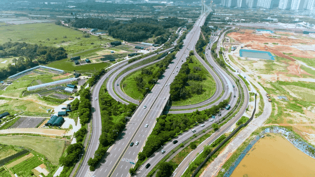 Highway and surrounding green fields