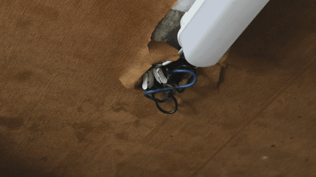 Exposed fluorescent light wires on the ceiling