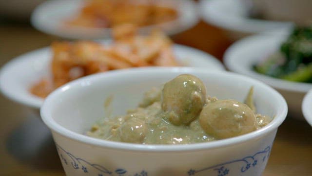 Variety of traditional dishes placed on a dinner table