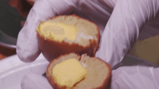 Cross section of egg bread cut with knife