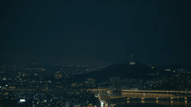 Night view of a city with a tower