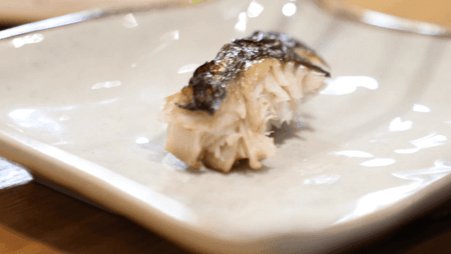 Grilled fish with wasabi on a plate