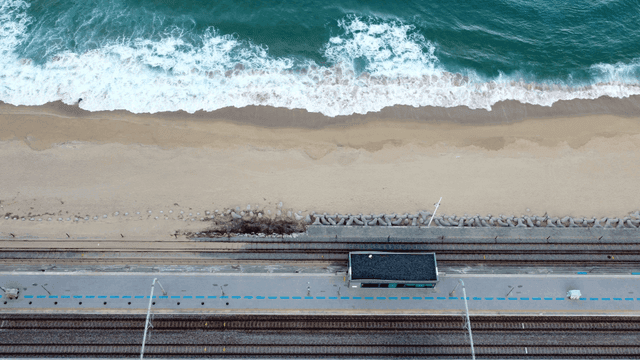 Coastal railway tracks by the ocean