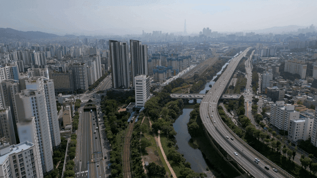 A bustling city with highways and skyscrapers