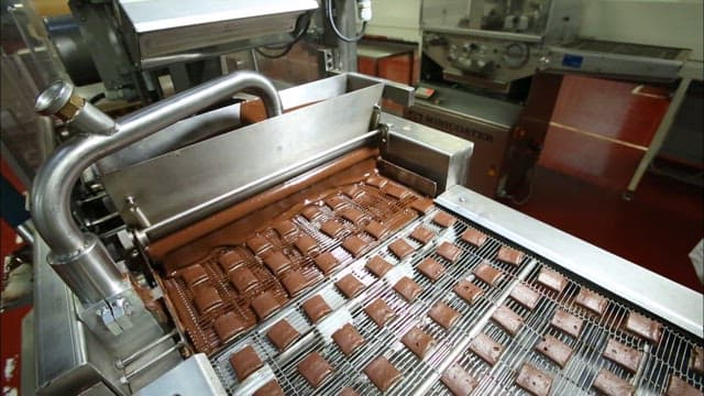 Chocolate Bars in Production on Conveyor Belt