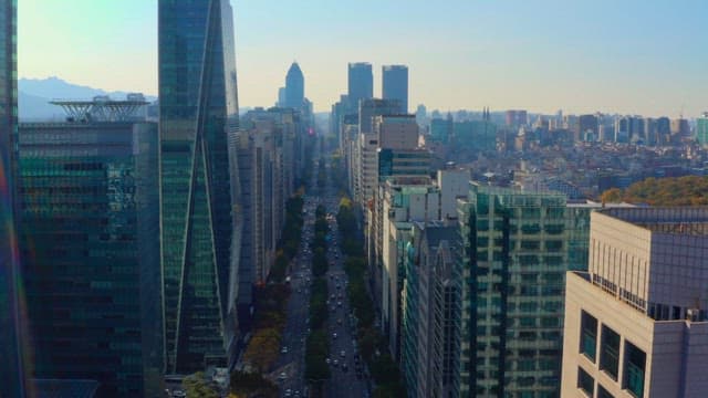 Bustling city street lined with skyscrapers