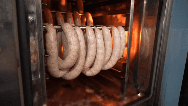 Handcrafted sausages baked in oven