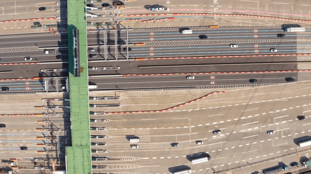 Busy highway with multiple lanes and vehicles