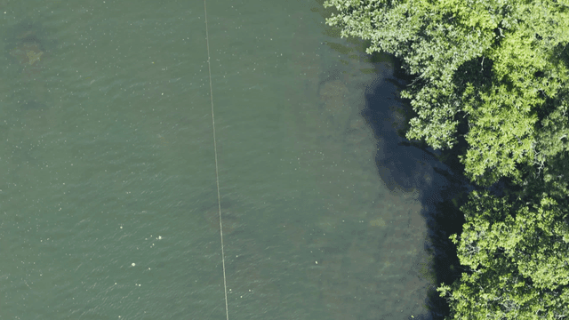 Clear river flowing through rocky landscape