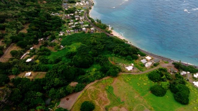 Aerial View of Coastal Village and Beach