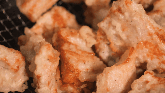 Fried pork in strainer