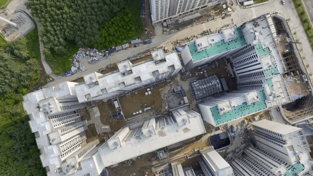 Aerial view of urban buildings and greenery