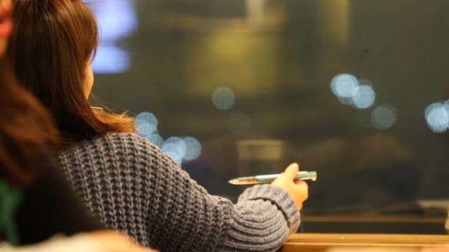 Woman enjoying a moment alone in a cafe