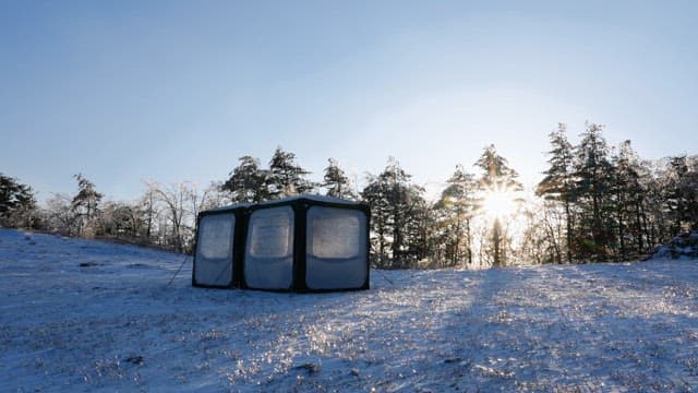 Snow-covered Landscape with Camping Tent