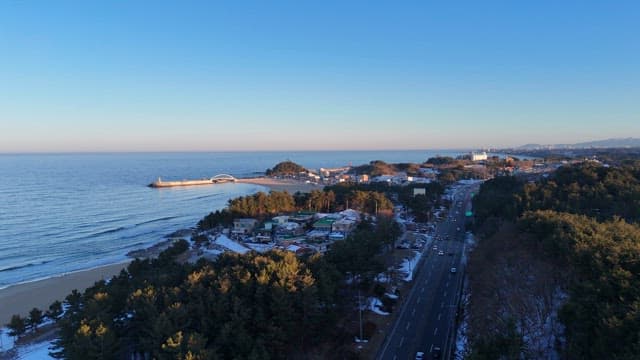 Coastal town with a beach and pier