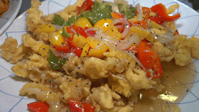 Colorful squid tangsuyuk on plate
