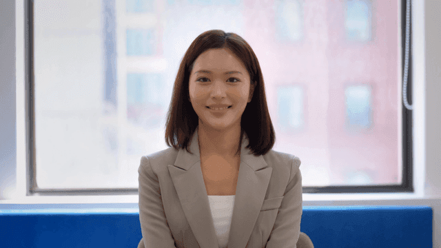 Smiling woman in suit