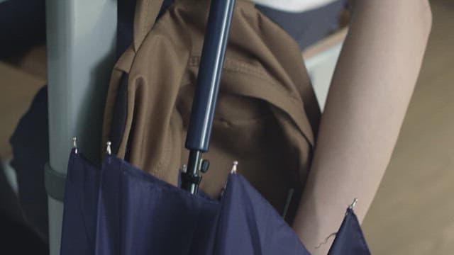 Student going through other people's belongings and stealing wallets