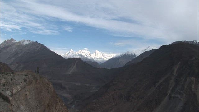 Majestic snow-covered Spantik Gold Peak seen in the distance