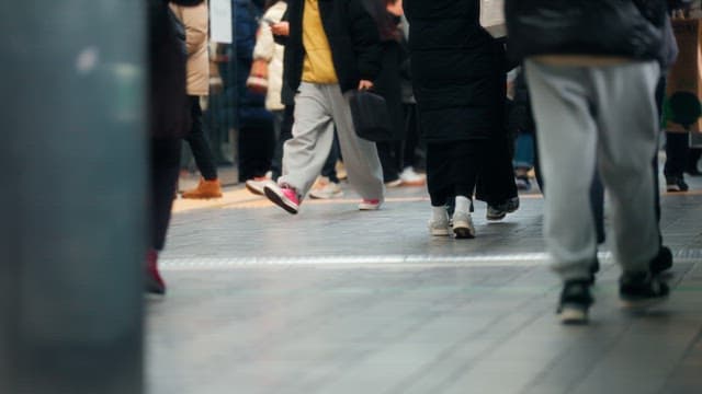 People moving in a busy subway station